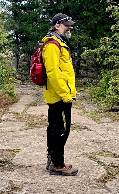 Jeff with a big beard, sporting an outdoorsman look